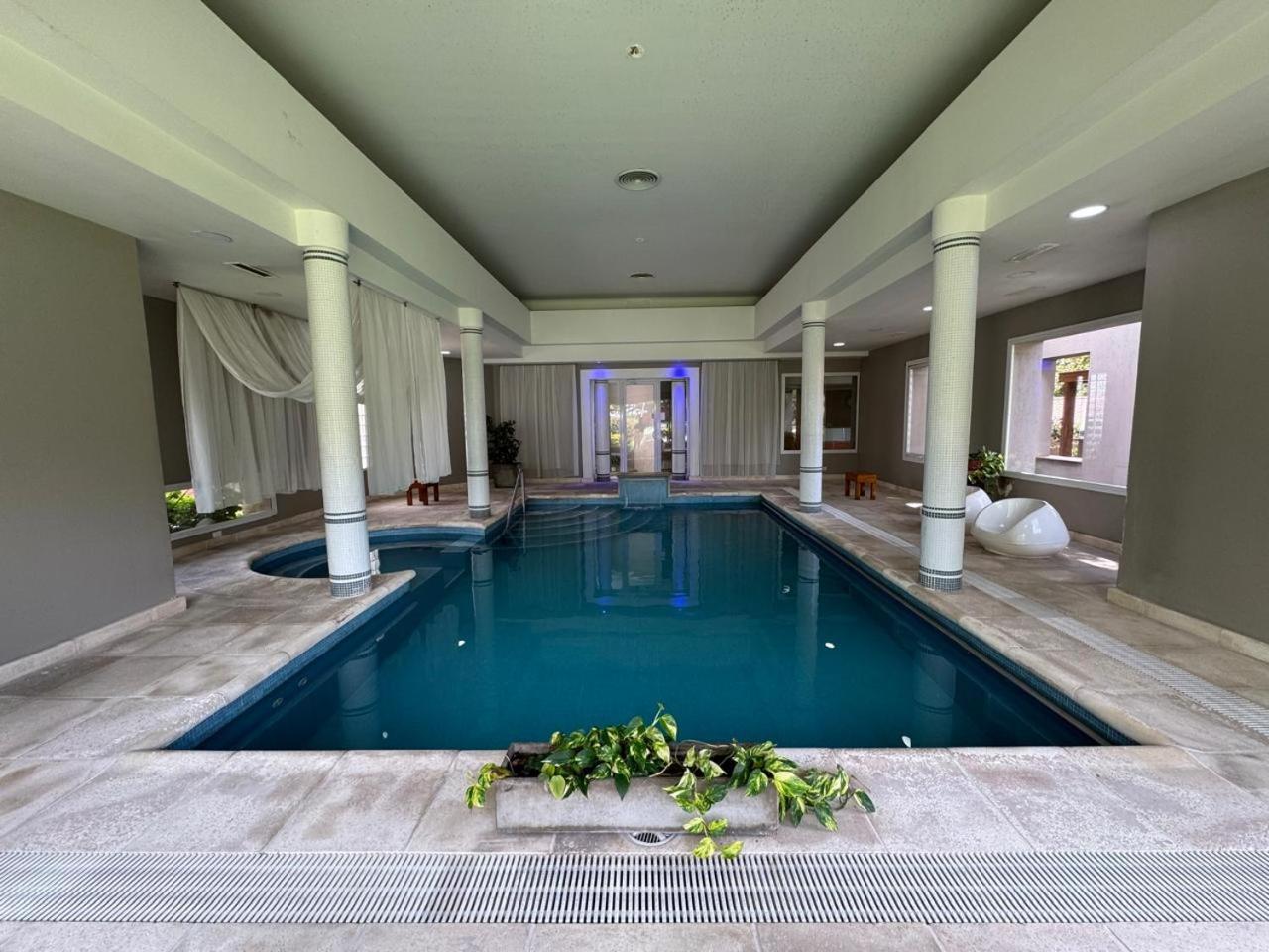 San Isidro Aparthotel Вила Карлос Пас Екстериор снимка